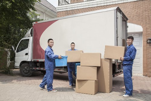 Moving team working in a Finchley residential street