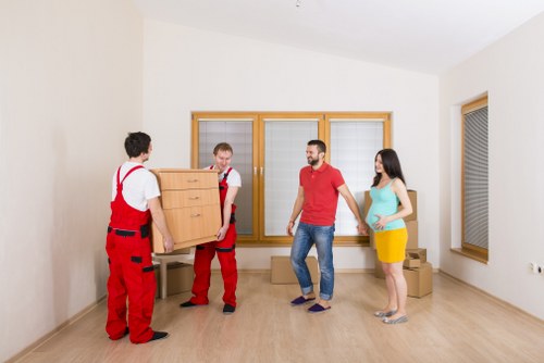 Removal company moving boxes in Finchley neighborhood