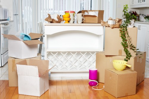 Packing and loading items into a moving van in Finchley