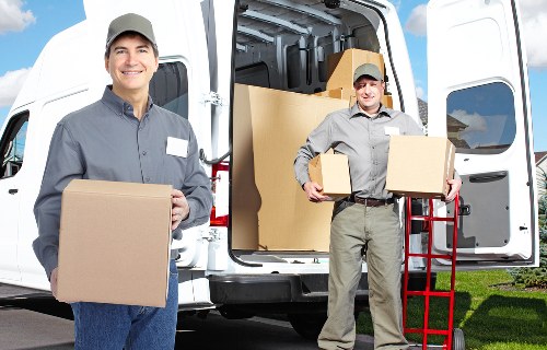 Worker using safe lifting practices during a move