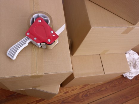 Careful packing of fragile items for a Finchley house move